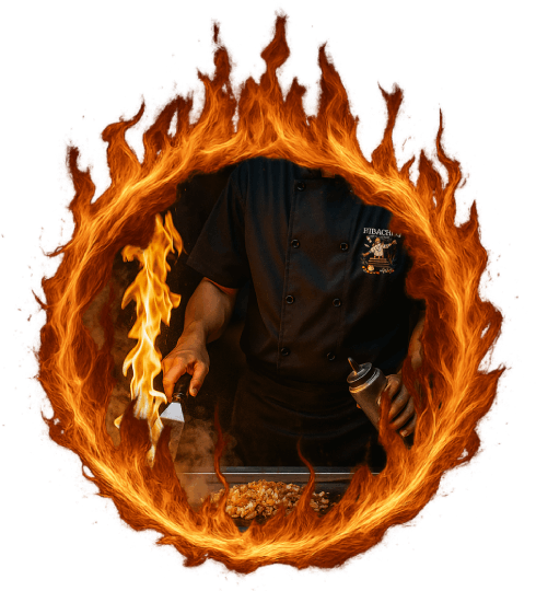Hibachi chef performing a live cooking show with tall flames on the grill